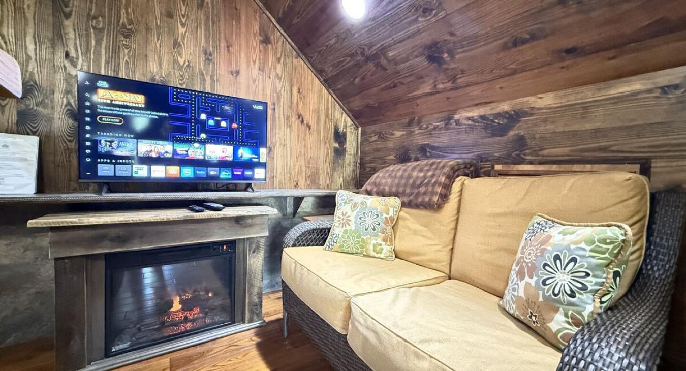 Seating area by the smartTV to relax after a long day.