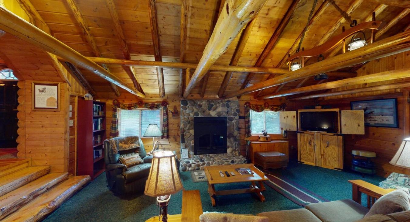 Large open living room with a wood fireplace. Bring your wood.