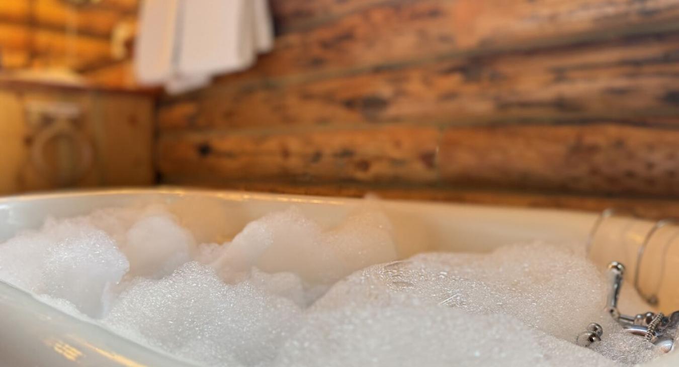 Relax in the classic claw foot bathtub.