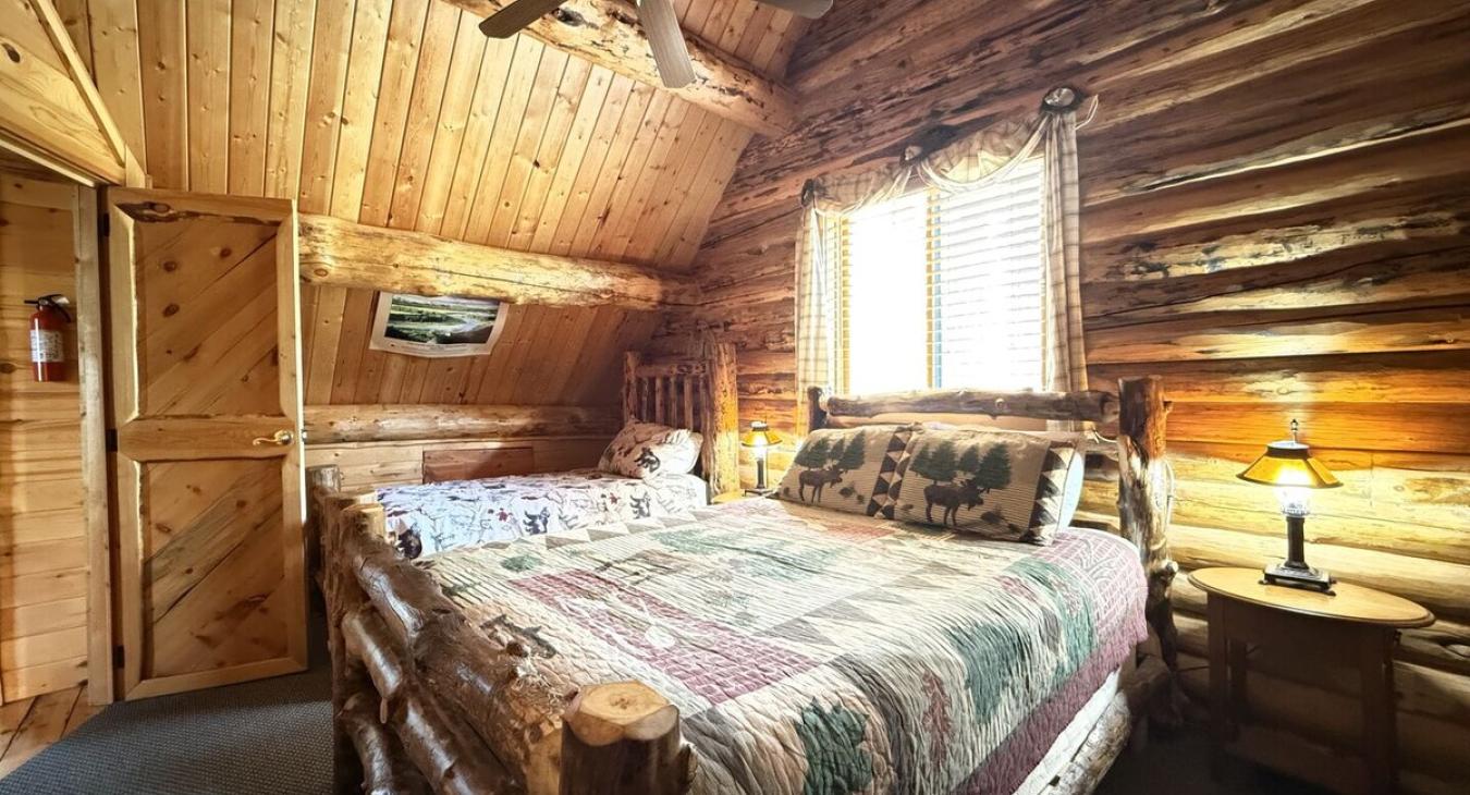 Bedroom #3 located upstairs with a Full and Twin bed.