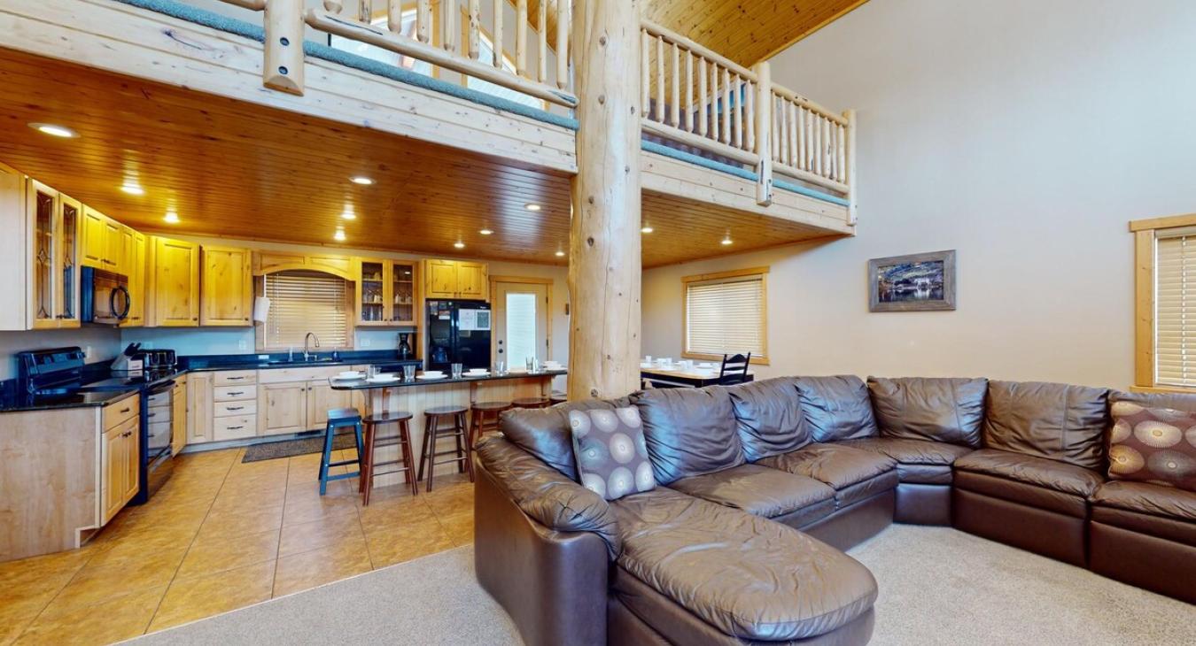 Open living room and kitchen to relax during your stay.