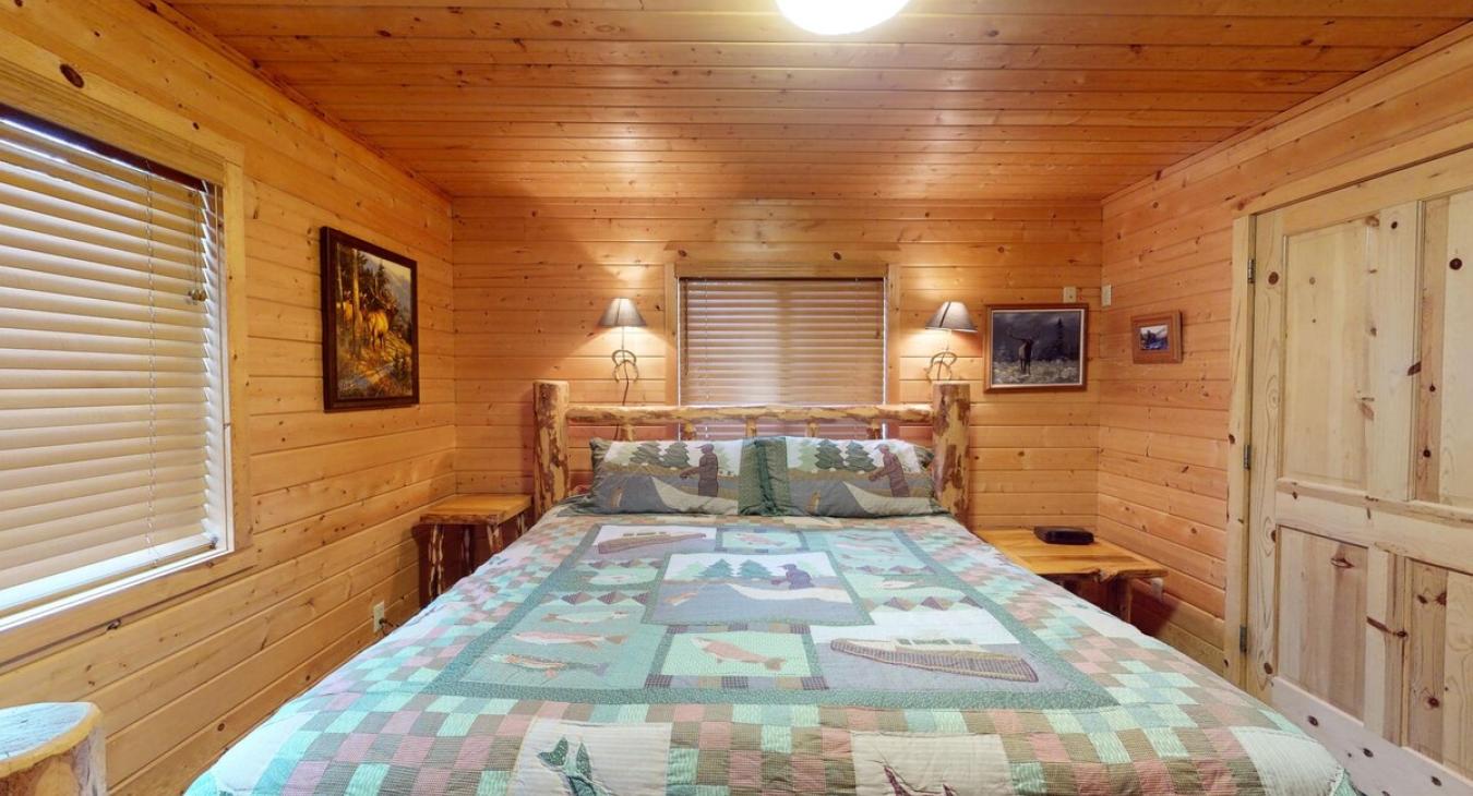 Master bedroom with a King size bed.