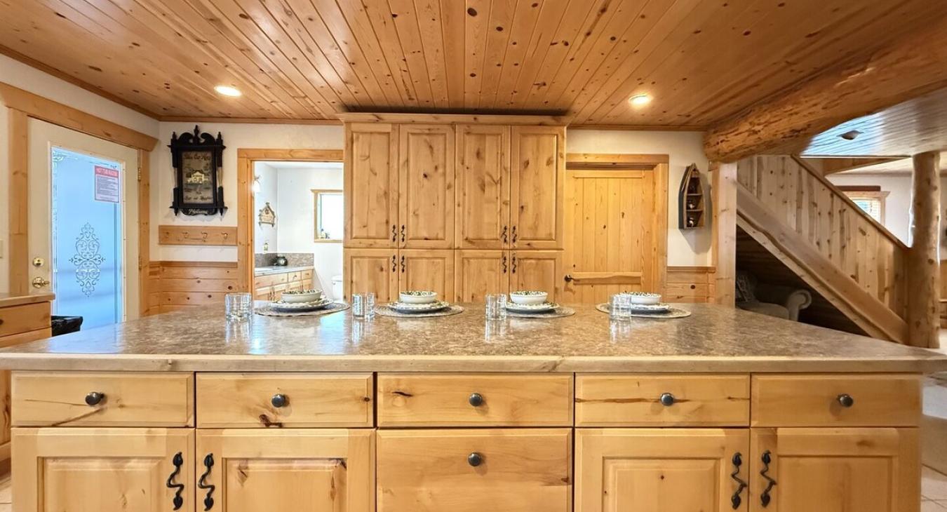 Large kitchen island that seats 4 comfortably.