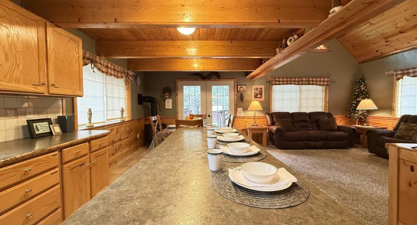 Full size kitchen with appliances, cookware, pots and pans, utensils, dishes, and basic cooking essentials.