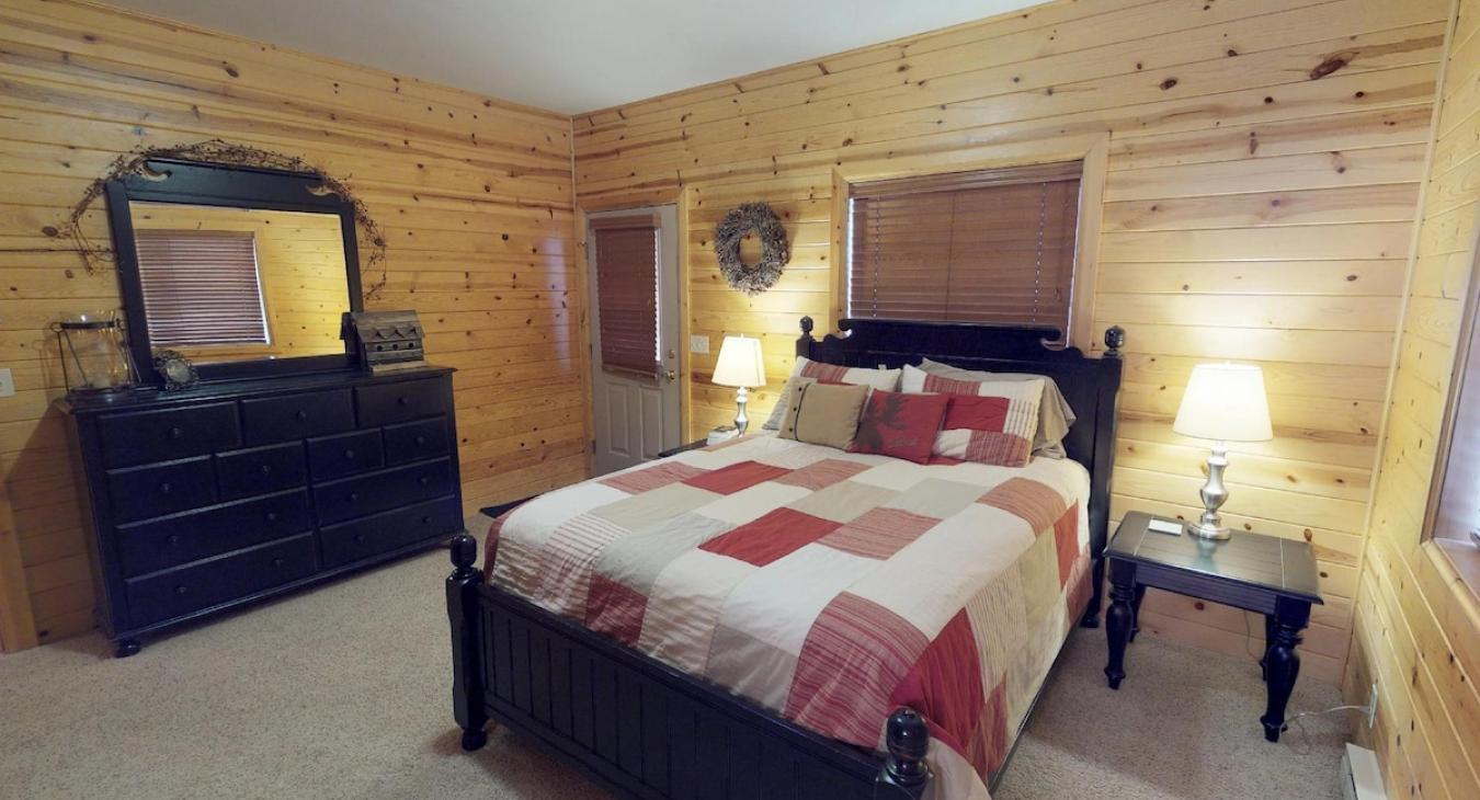 The master also has direct access to the deck and a dresser.