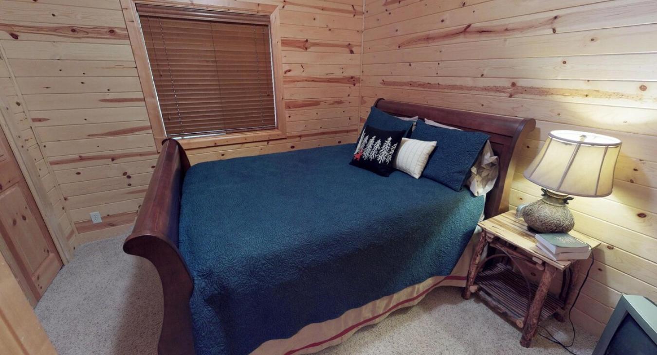 Bear Hollow also has another private bedroom with a queen bed.