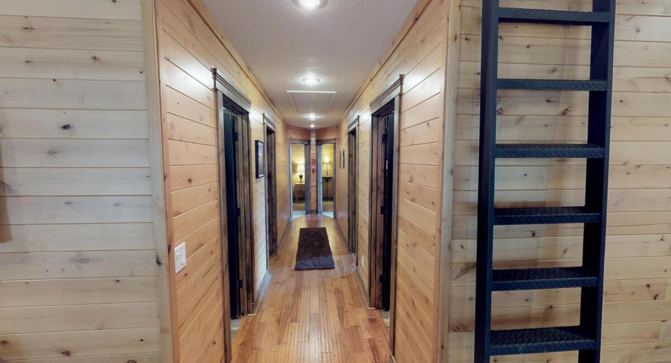 Hallway to access all the different rooms and bathrooms.