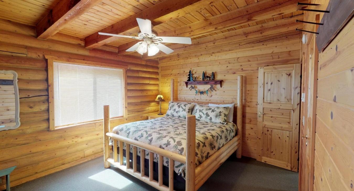 Master bedroom with a King size bed.