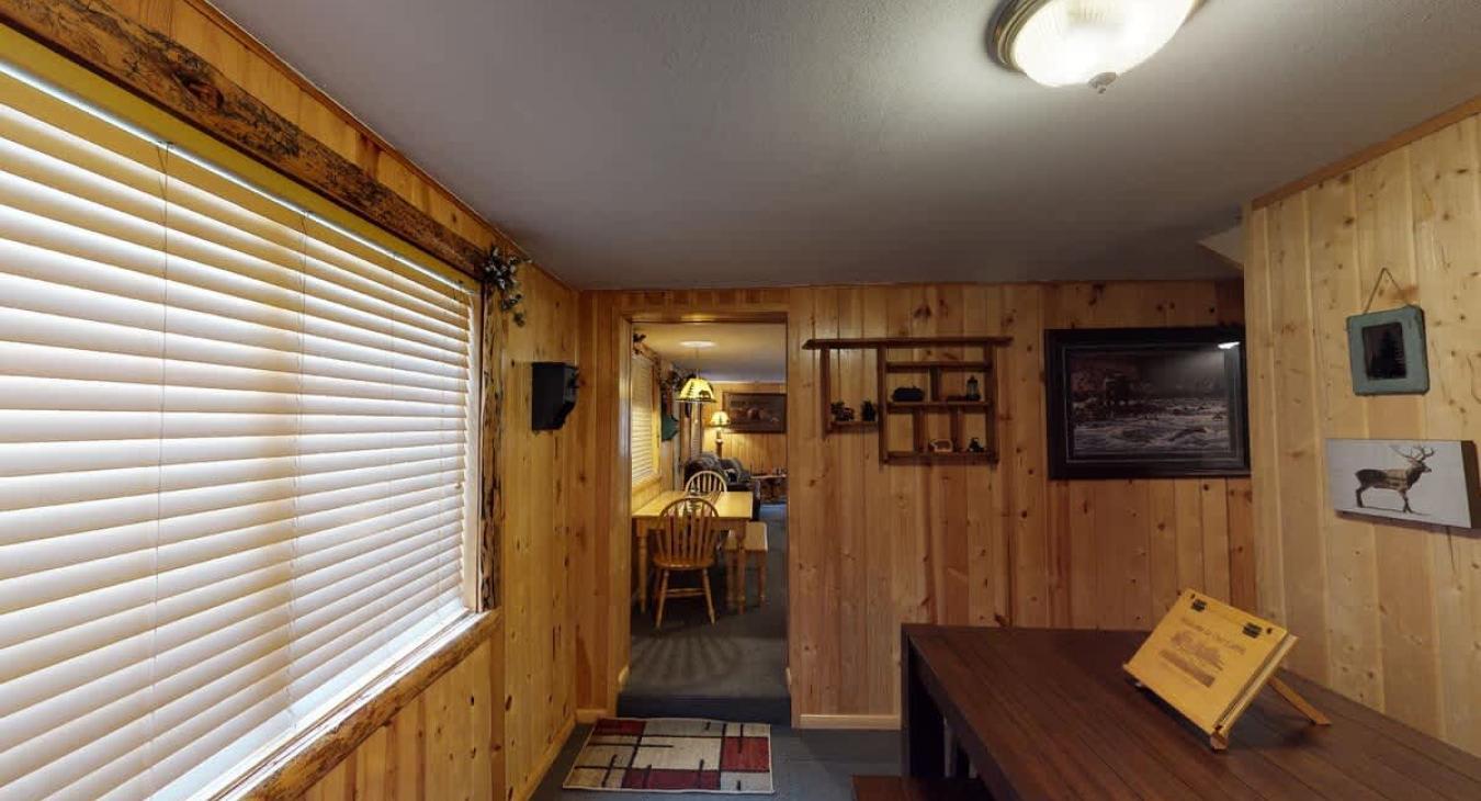 Access to the living room and kitchen are through the door pictured here.