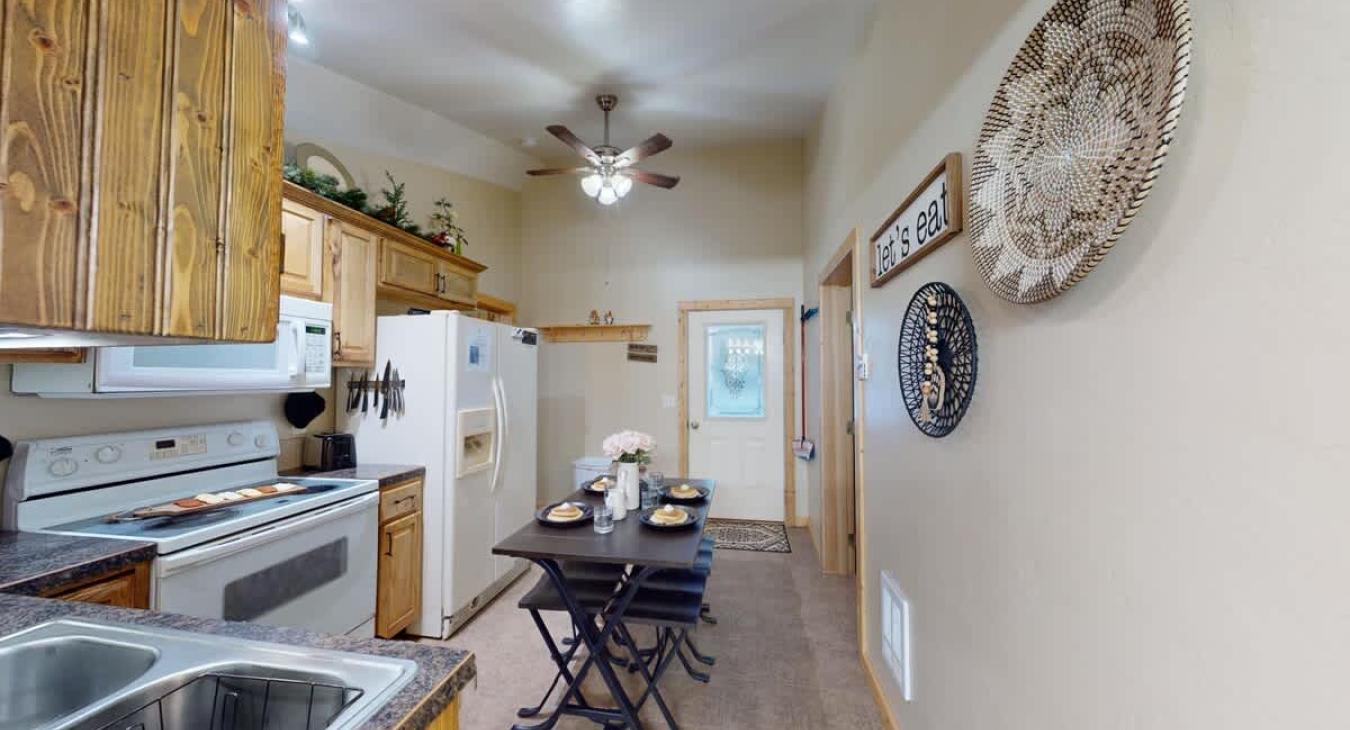 View of the kitchen area from the bathroom entrance.
