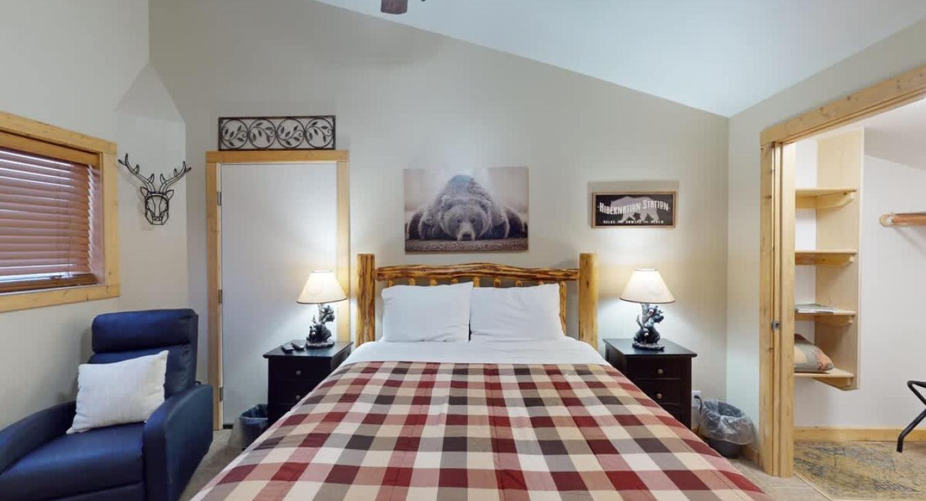 The bedroom has a queen bed that comfortably sleeps 2 people.