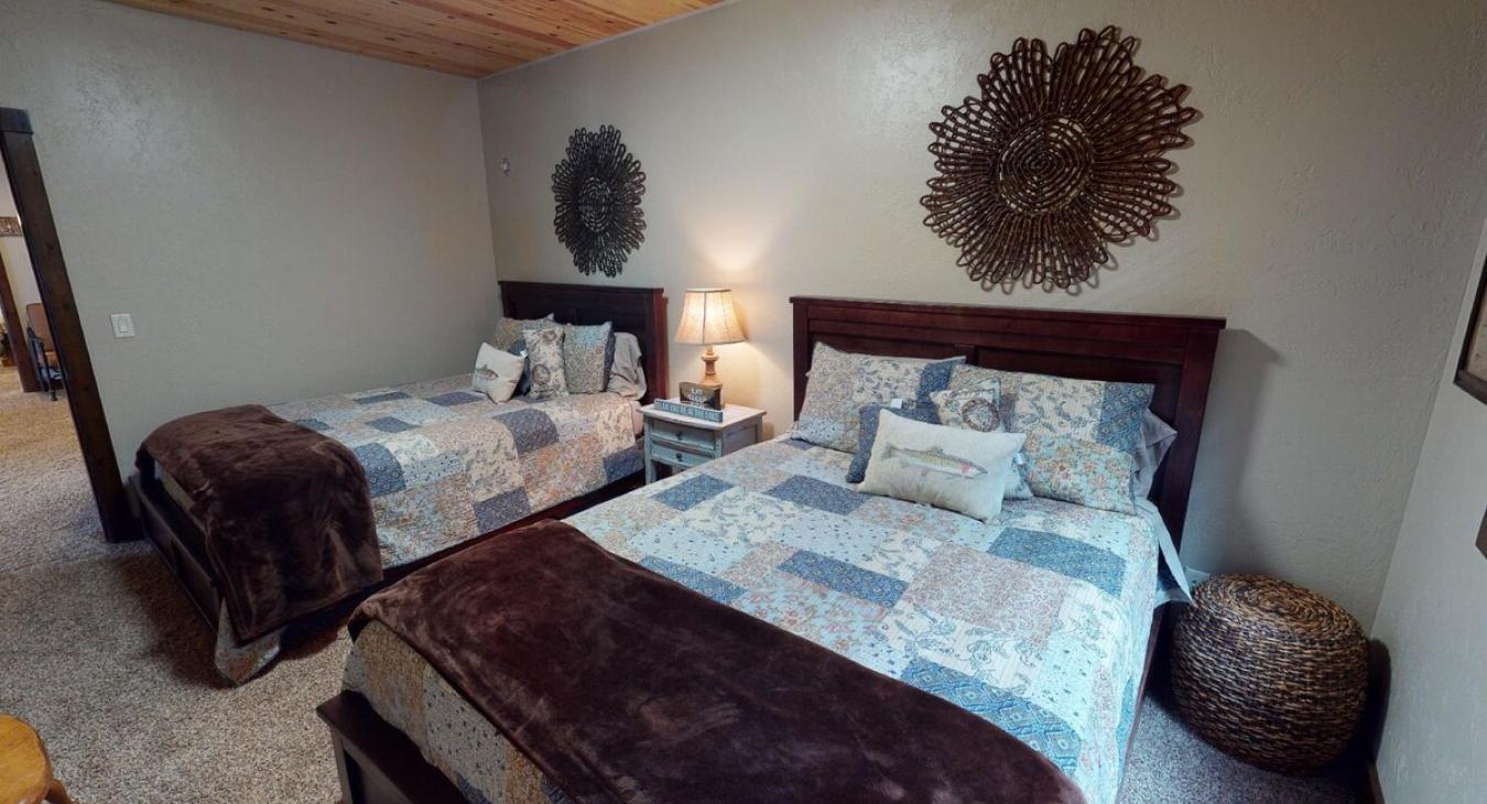 1st Bedroom downstairs with 2 Queen beds.
