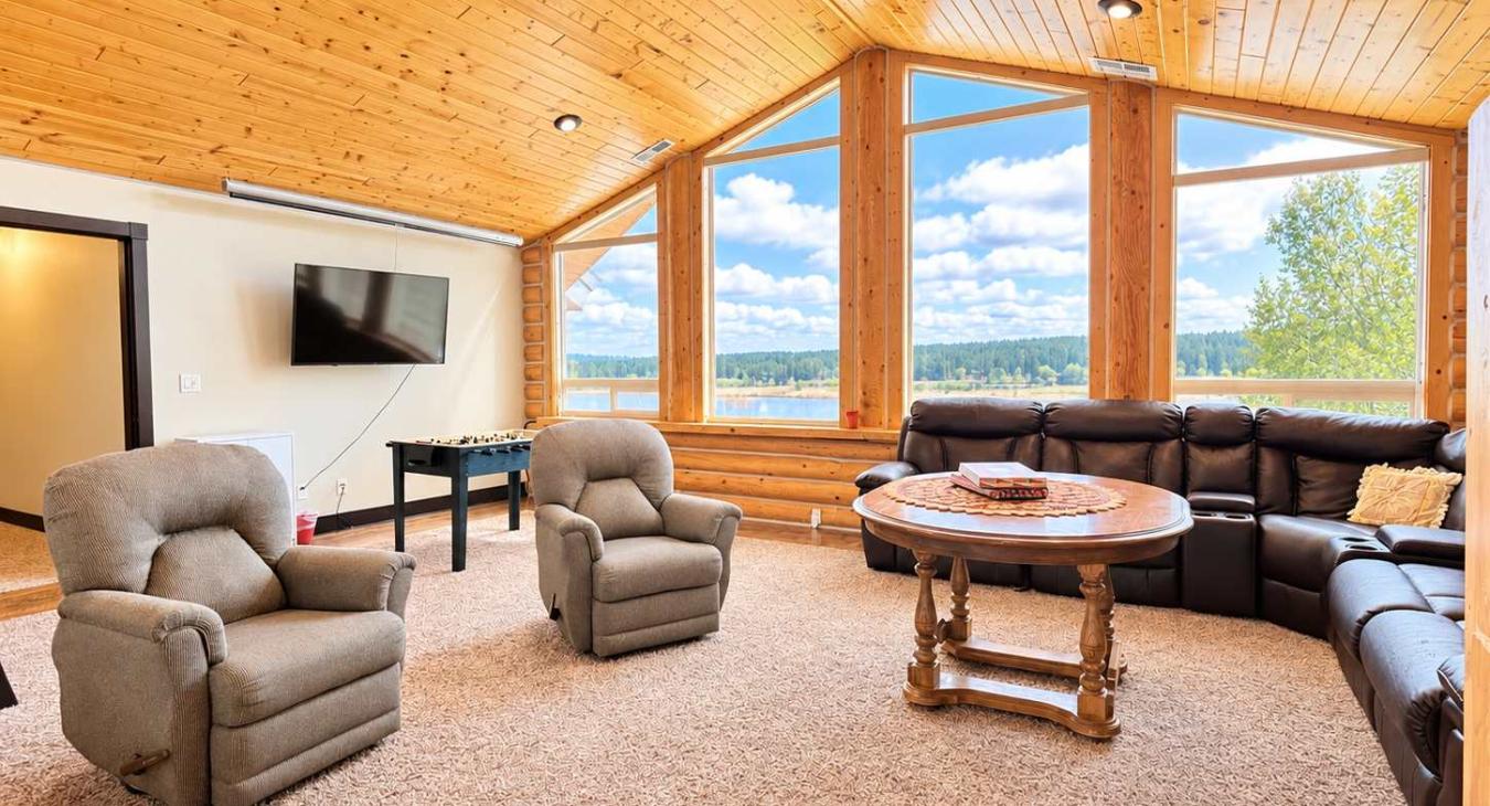This cabin offers lots of natural lighting to illuminate the bunk room/ game room.