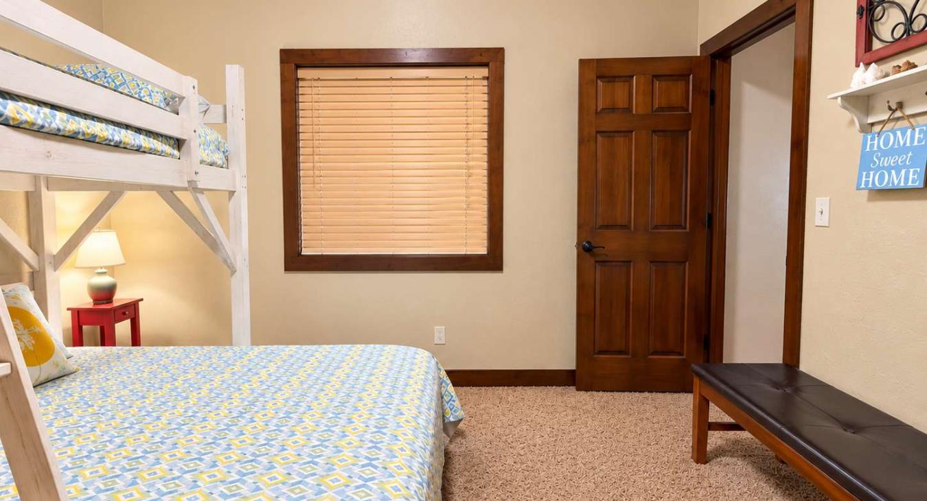 3rd Bedroom located downstairs with 1 Twin over Queen bunk bed.