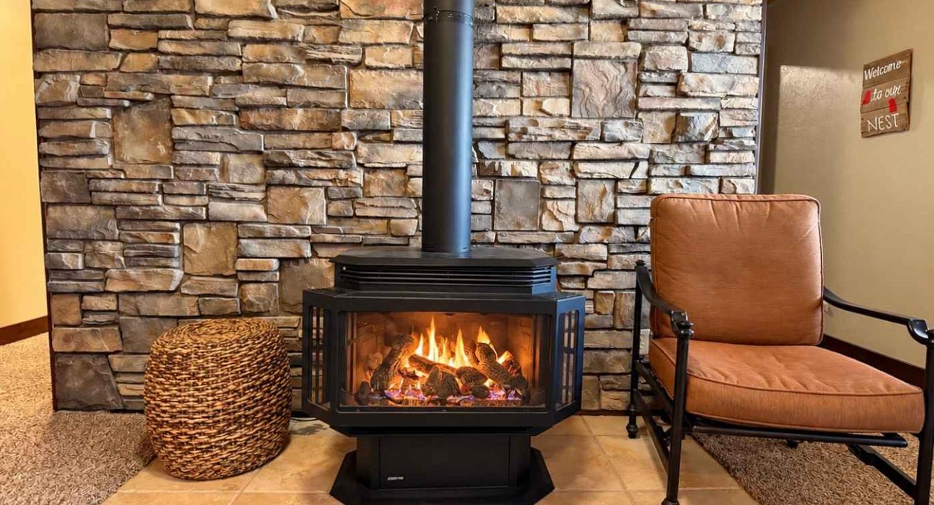 Propane fireplace located in the basement living room.