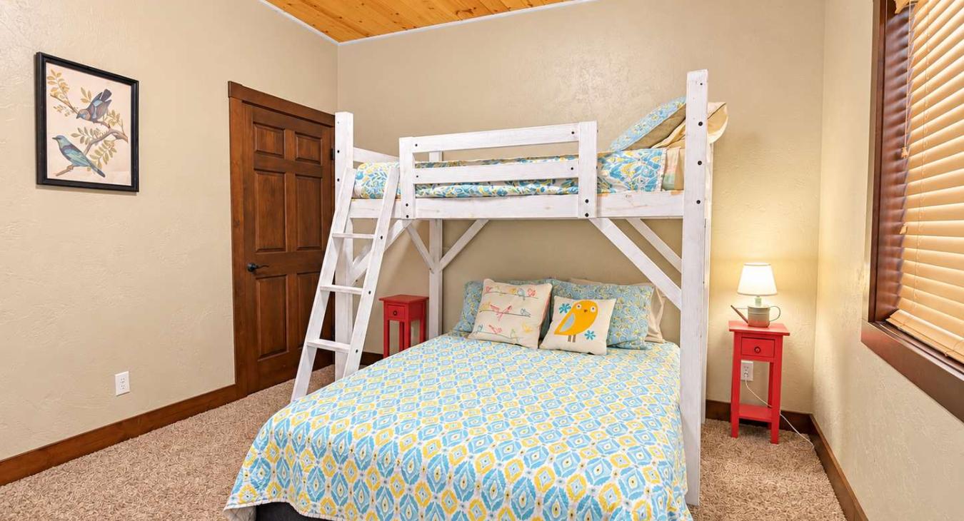 3rd Bedroom located downstairs with 1 Twin over Queen bunk bed.