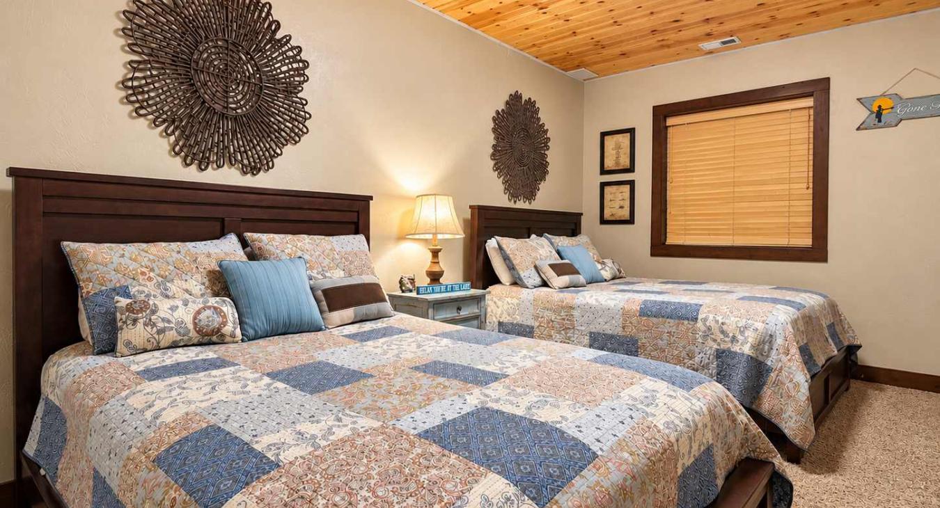 Basement Bedroom #4 with 2 Queen beds.