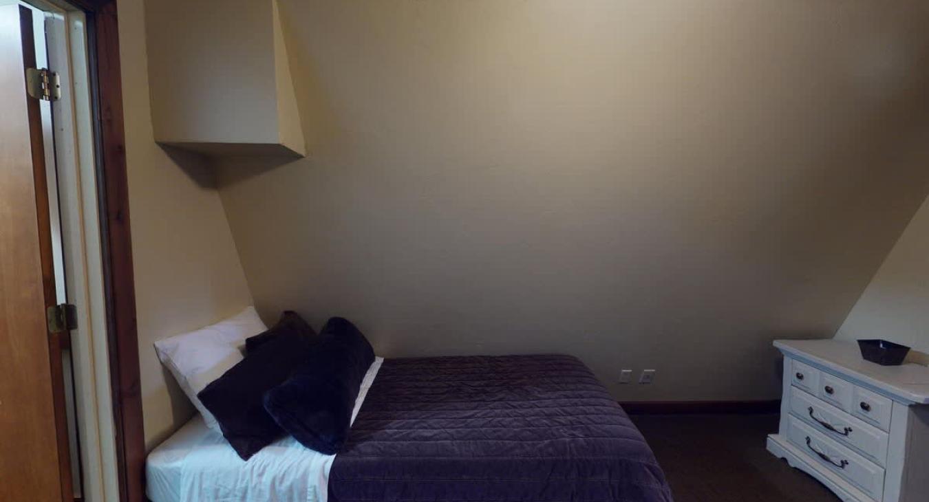 The third bedroom features a twin bed.