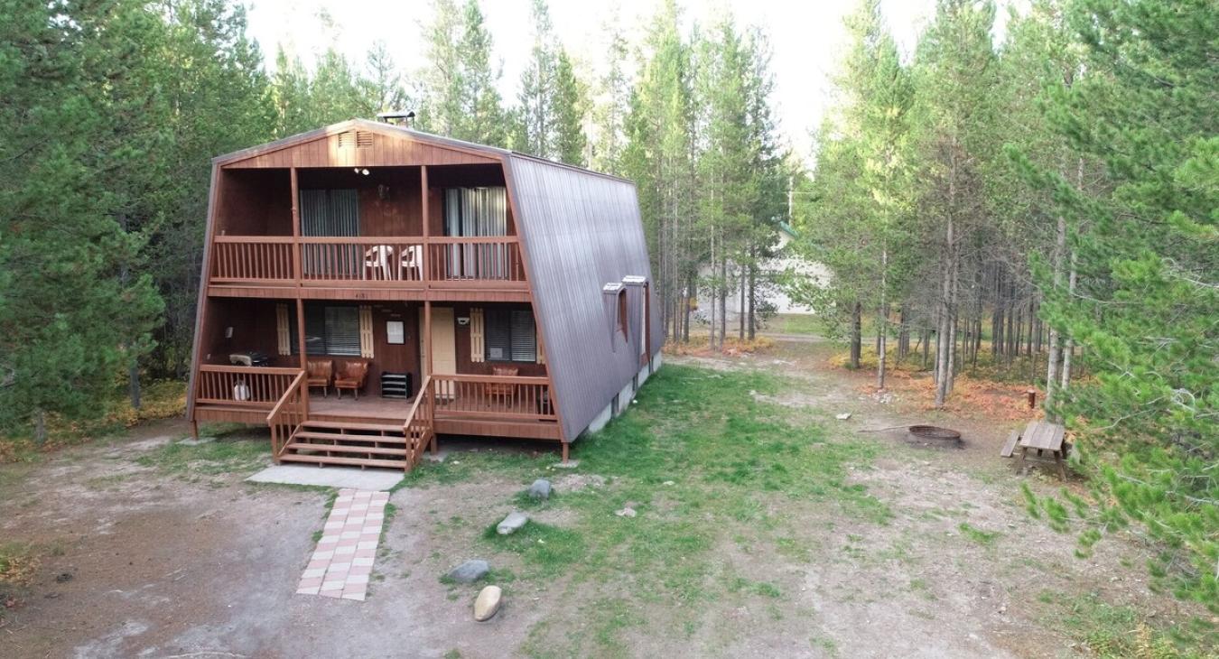 There is plenty of room for everyone to park in the front of the cabin and a fire pit area with a picnic table.