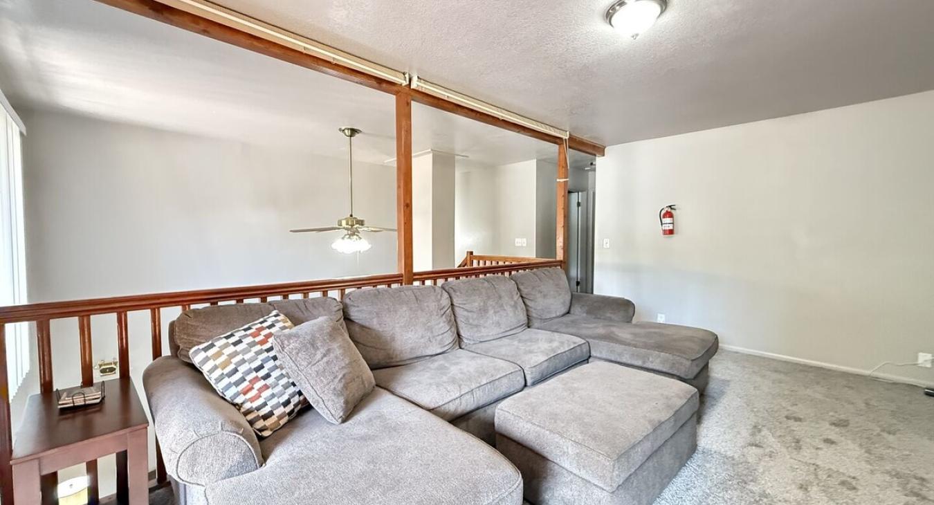 In the loft area there is a large couch and a 55 inch Smart tv. There is also a DVD player included in the entertainment center.