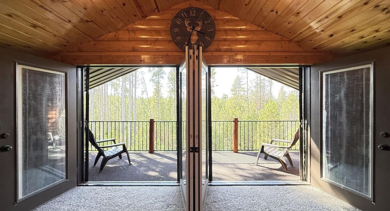 Additional seating in the loft with access to the deck here.