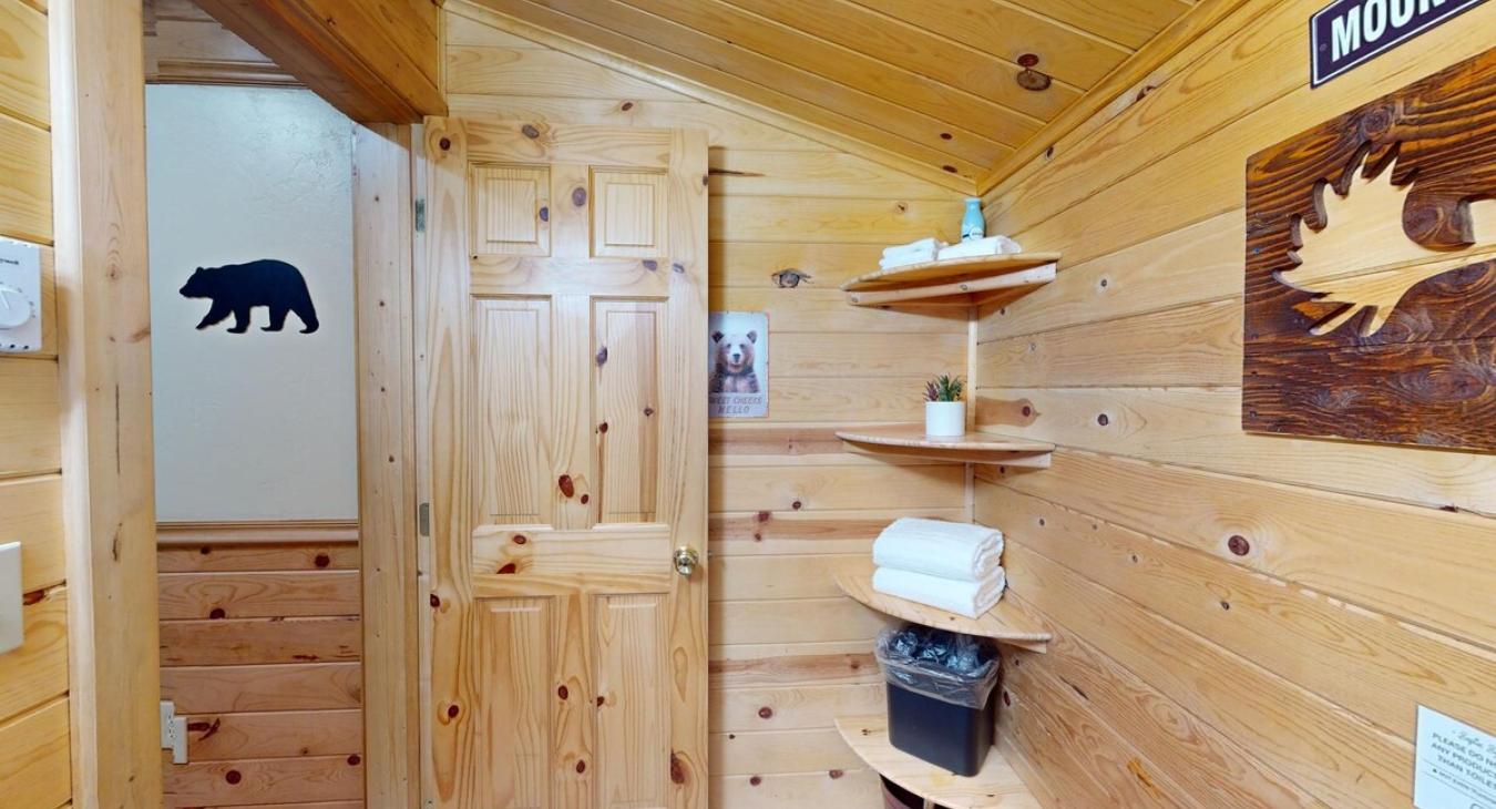 Open bathroom with plenty of space and storage.