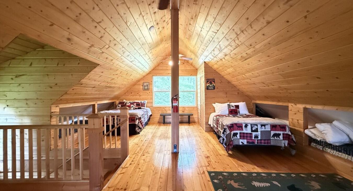 Loft area with 2 queen beds.