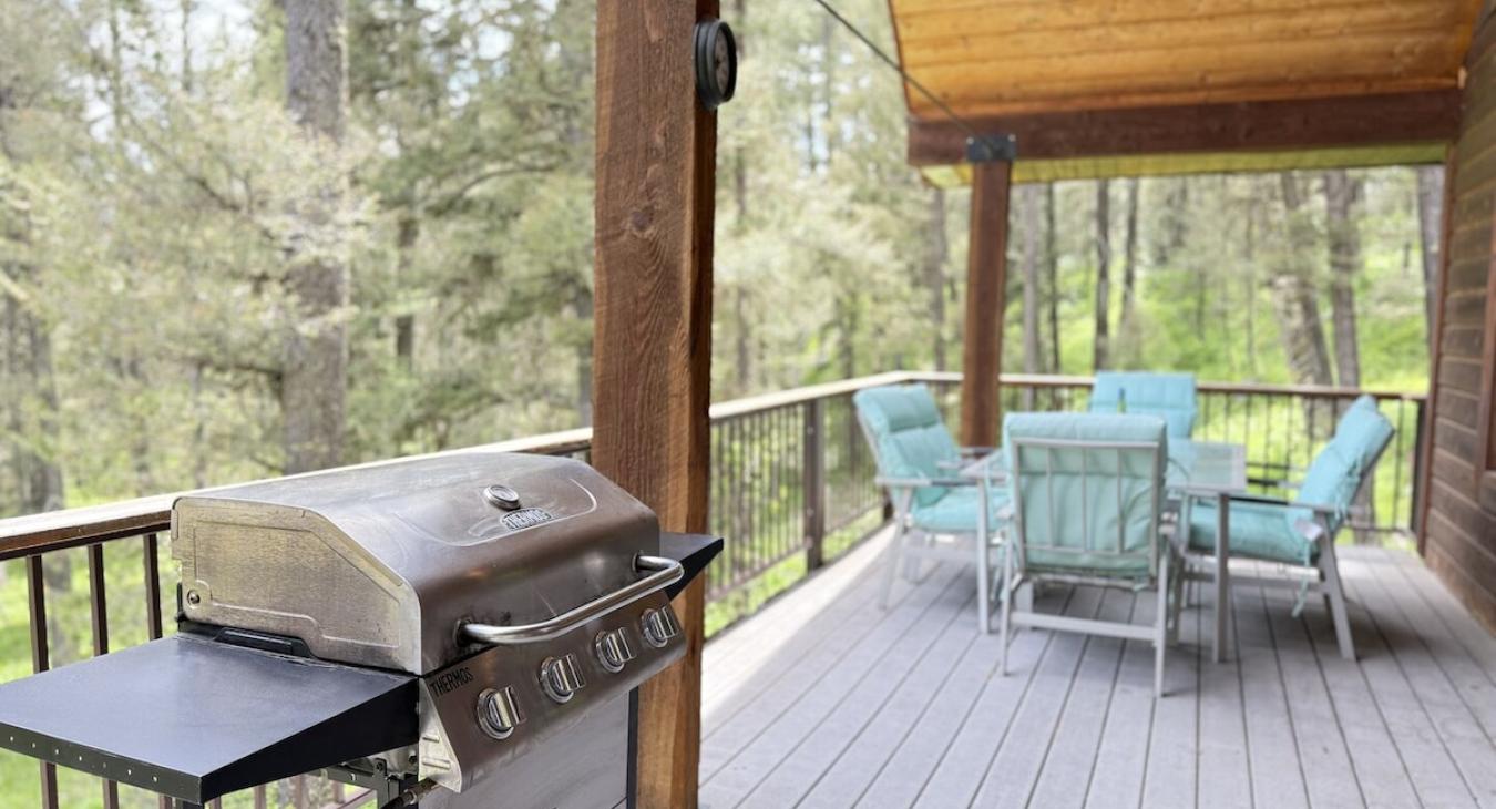 Deck with table for seating.