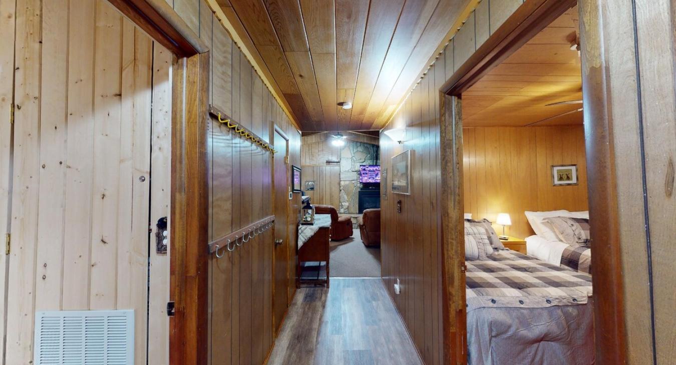 Large hallway to access both bedrooms and the bathroom.