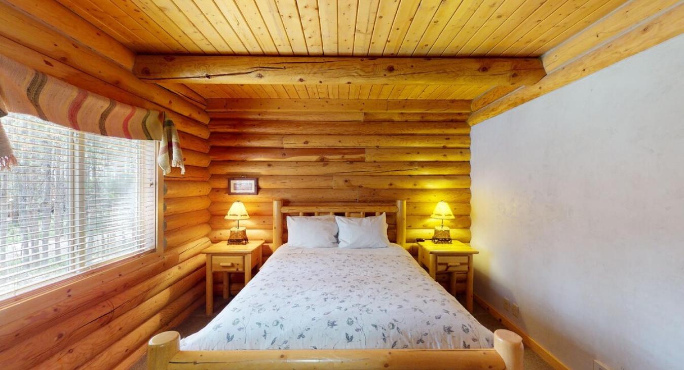 Bedroom #1 located on the main level with a Queen size bed.