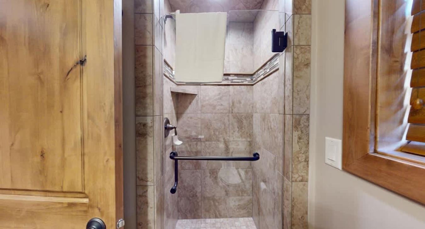 Spacious walk in shower.