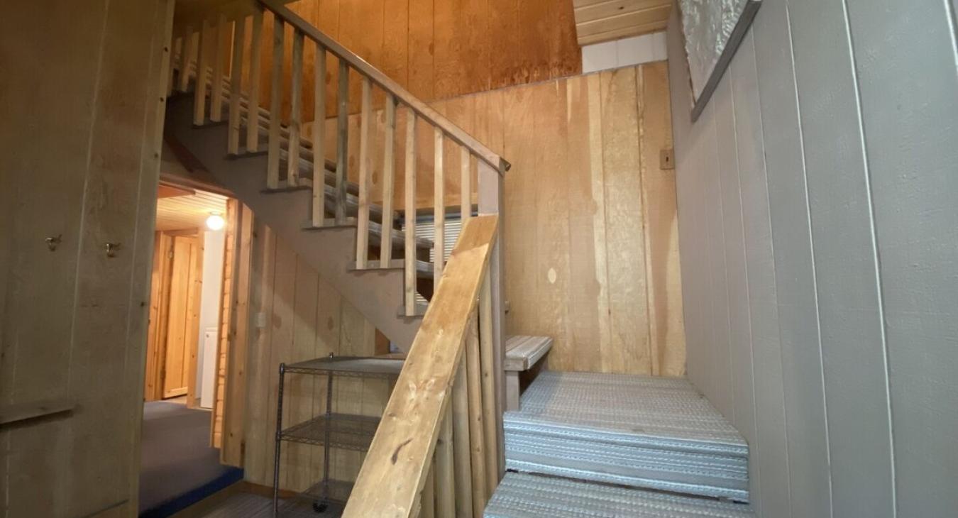 Access to the upstairs loft from the stairs.