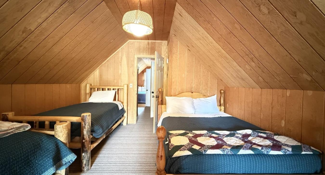 Access to the other bedroom through this door.