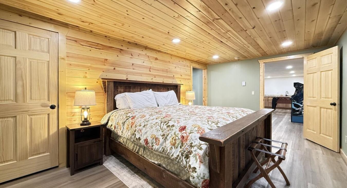 Basement King Bedroom by the game room and bunk room.