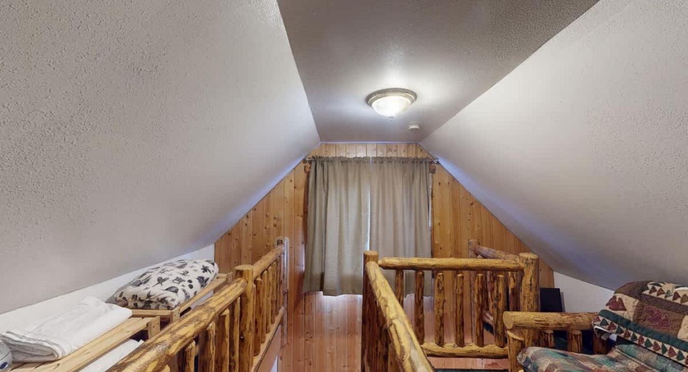 Upstairs loft with sofa.