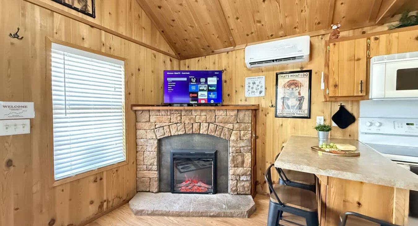 Tv is located in the living room for entertainment.