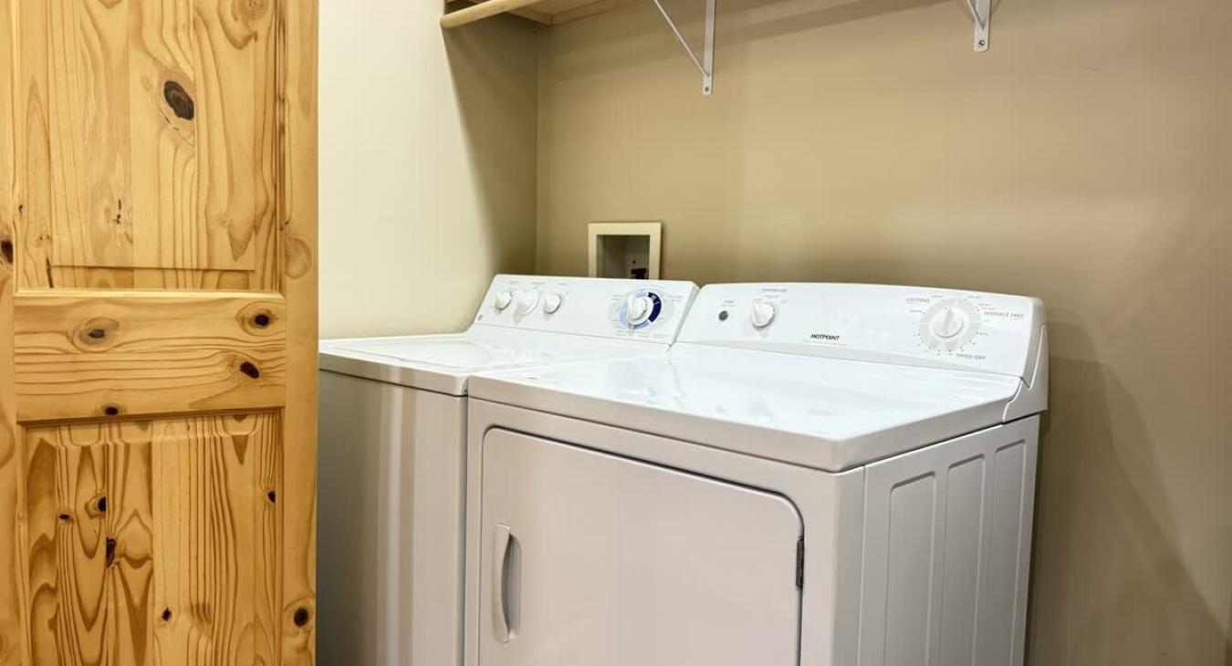 Laundry closet with hangers and closet rod