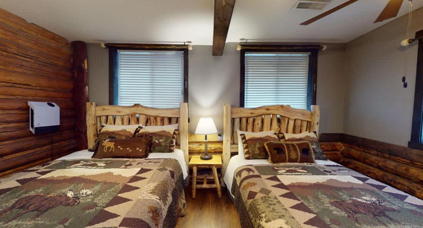 Bedroom #3 on the main level with 2 Queen size beds.