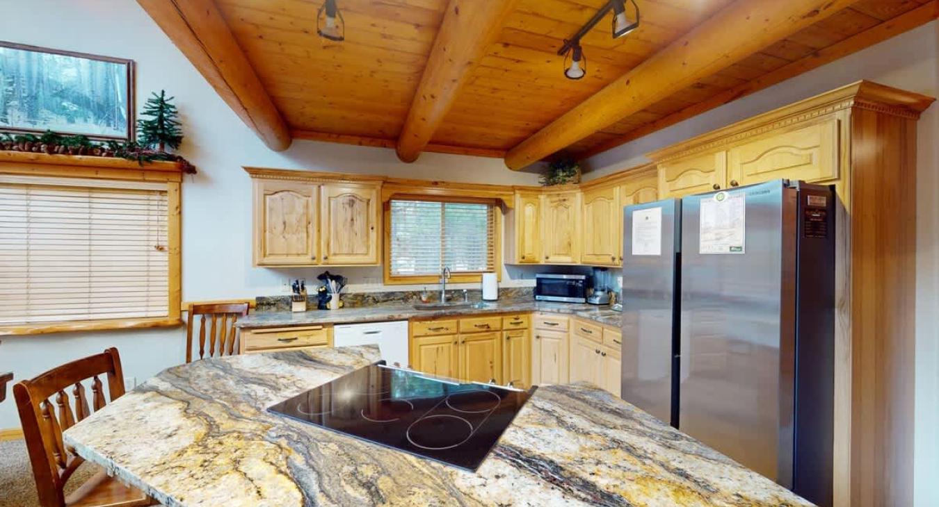 Appliances, cookware, dishes, silverware, basic spices, and cooking utensils are provided.