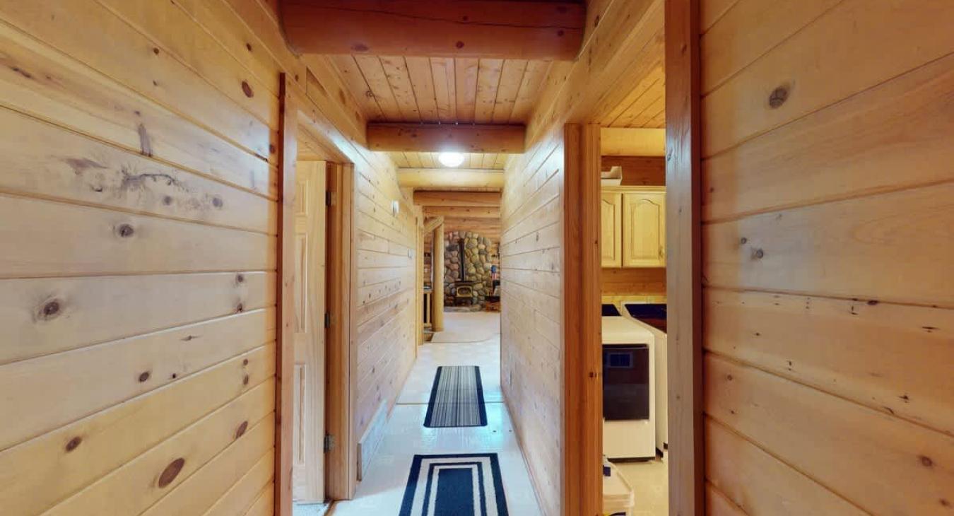 Entryway in the main level to access the laundry room and other bedrooms.