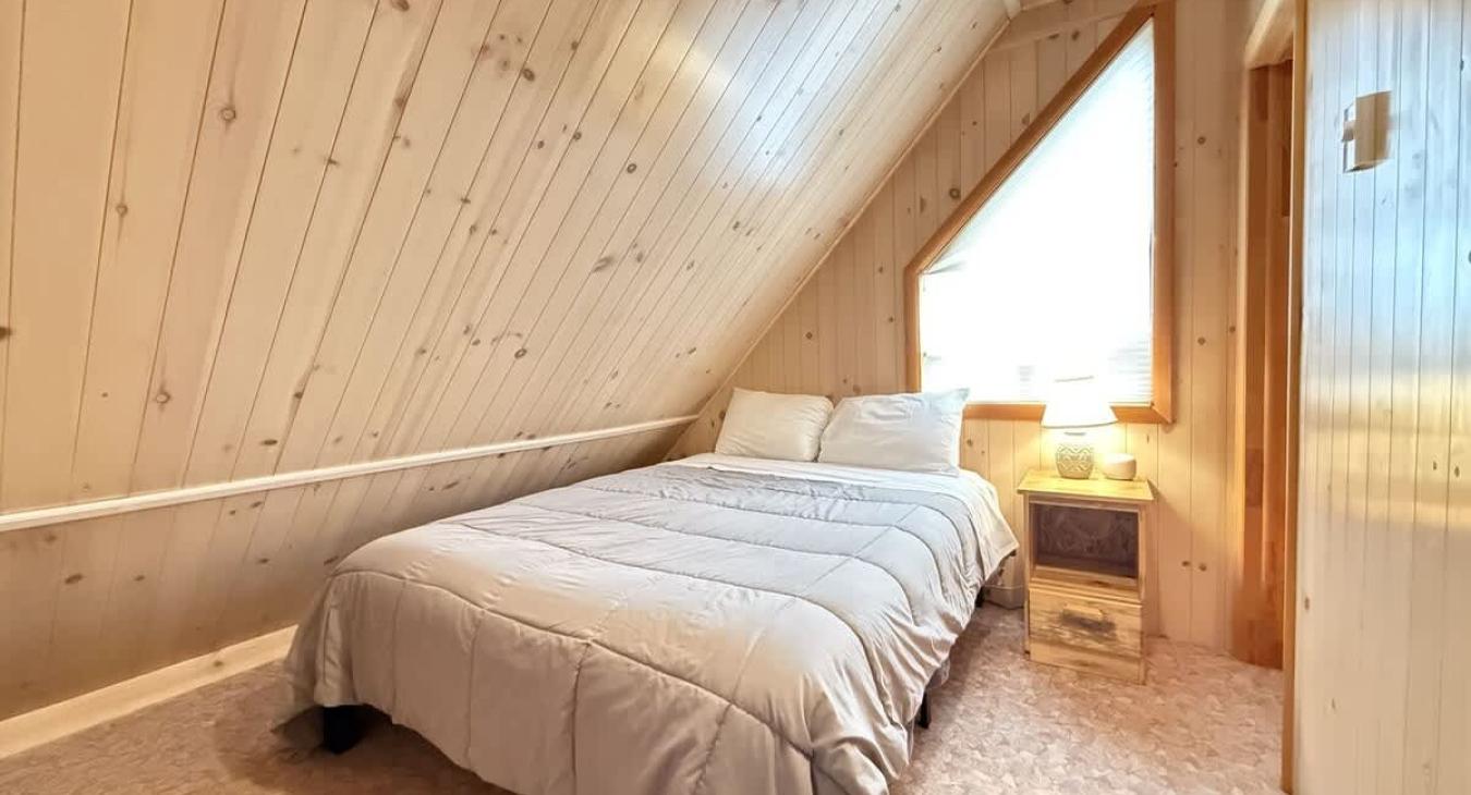 Large window that allows natural light to brighten the room.