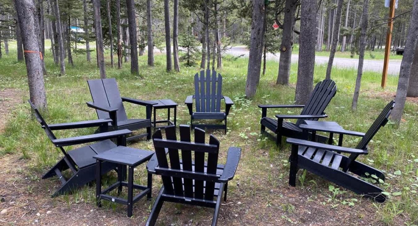 Cabin comes with outdoor seating to enjoy the scenery.