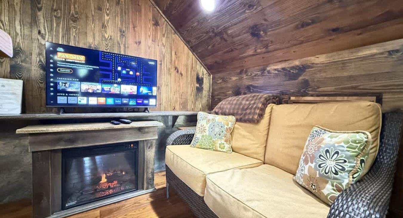 Seating area by the smartTV to relax after a long day.