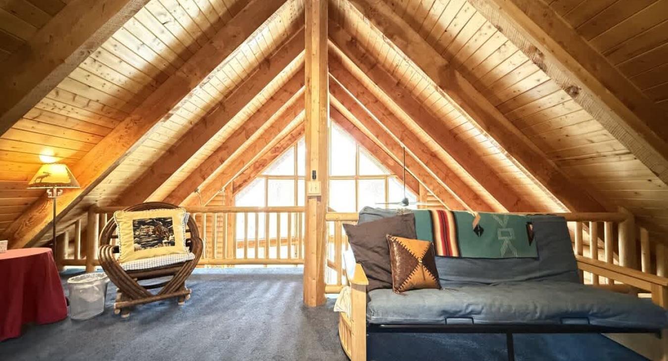 Futon with pull out bed with extra beds.