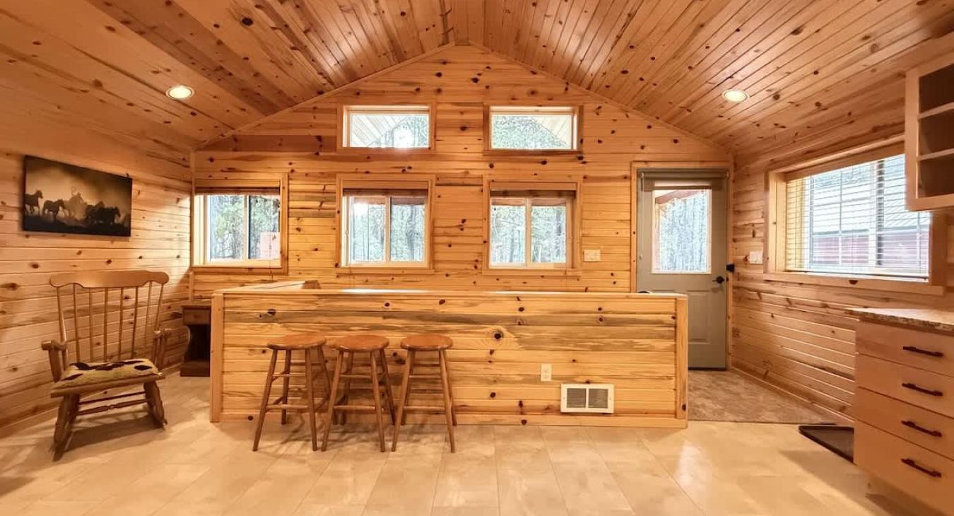 Front entry leading to the deck with the BBQ grill.