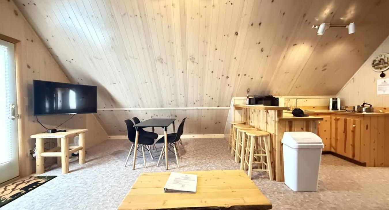 Table perfect for up to 4 people near the kitchen and living room.