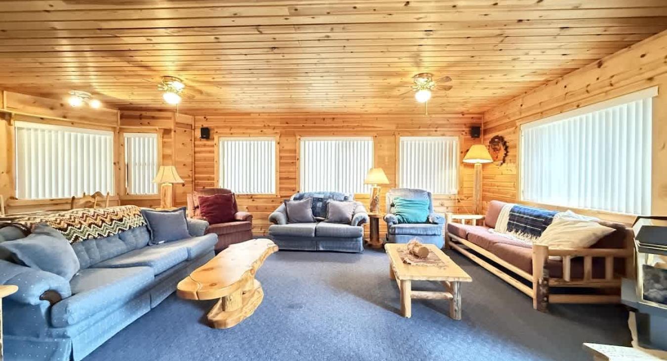 Living room with selection of couches for relaxing.