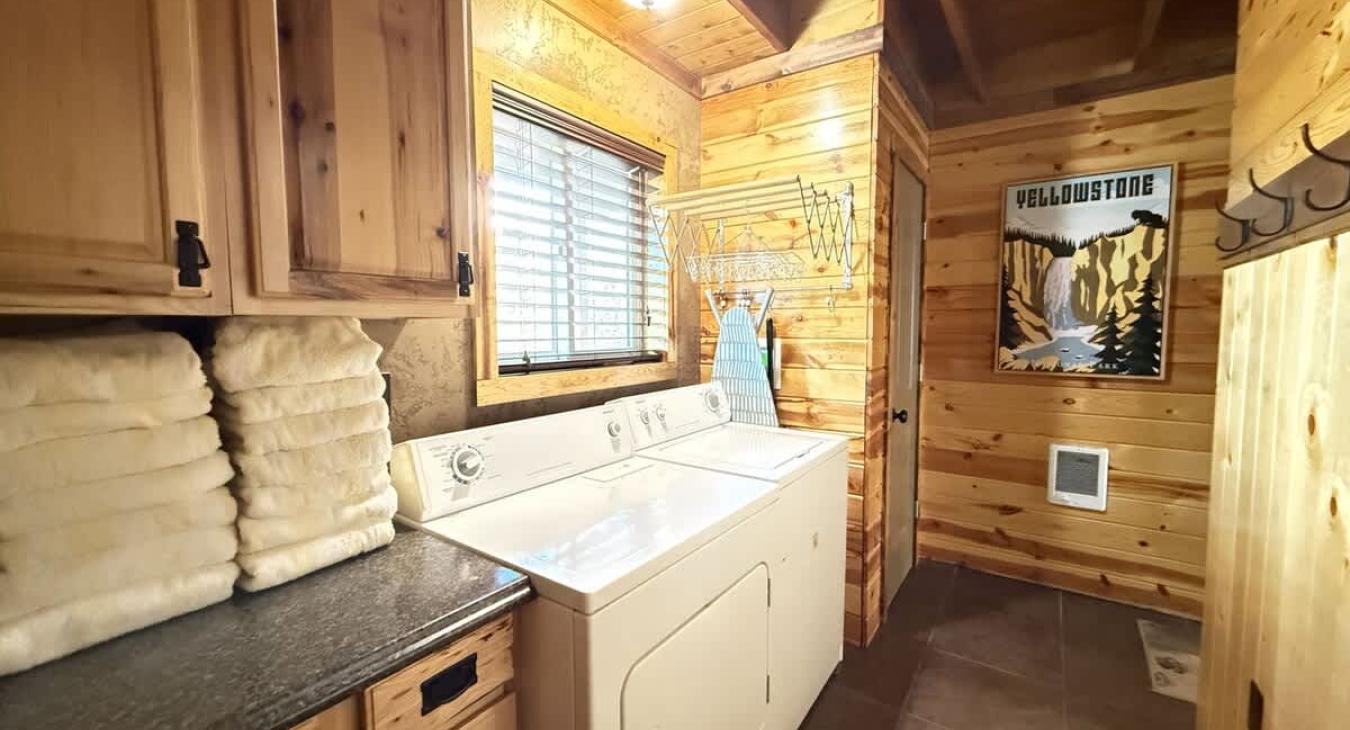 Washer and dryer is located on the main level. Hot tub towels and laundry soap provided.