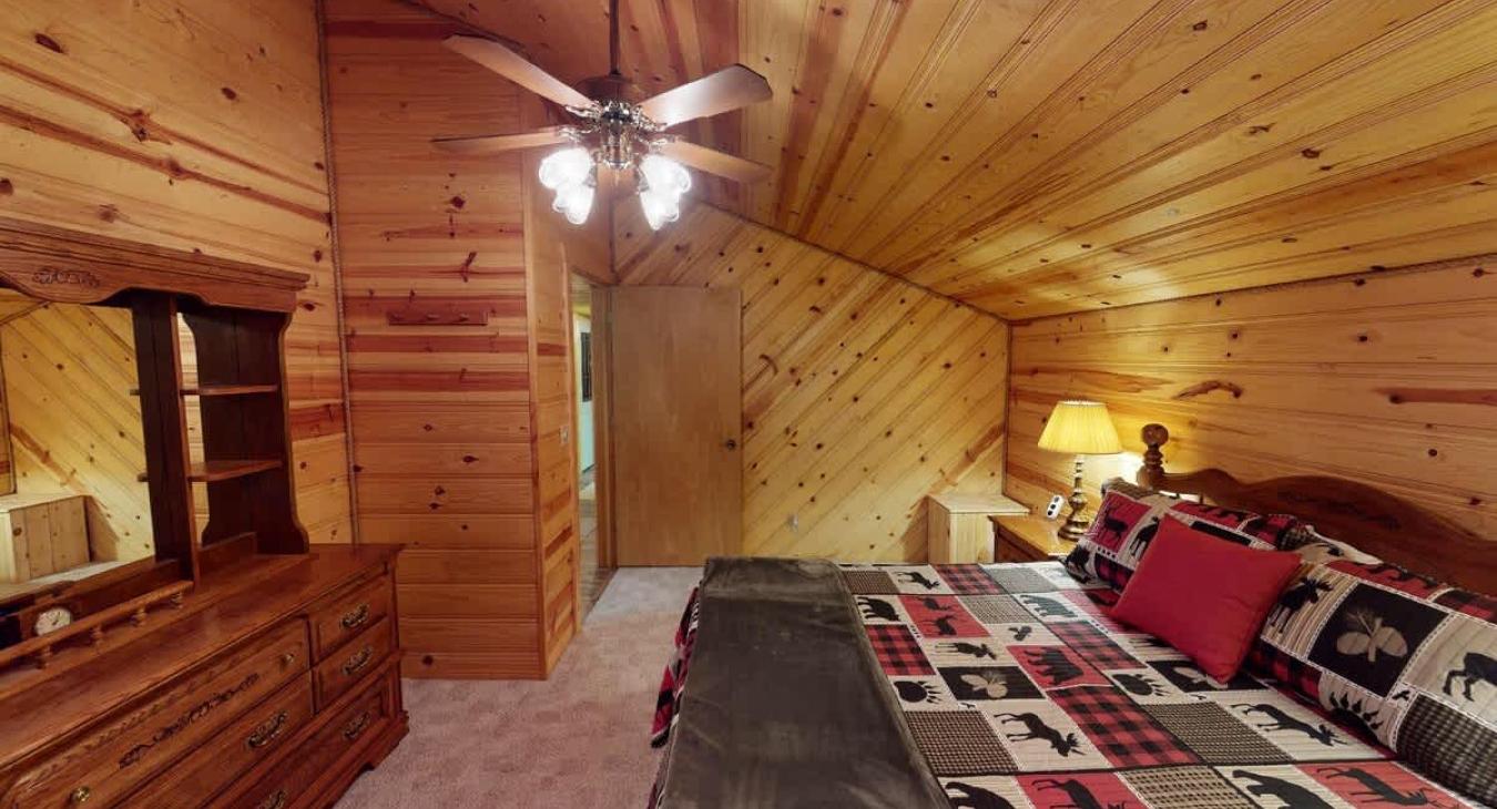 Bedroom has lots of storage from the dresser to place your belongings during your stay.