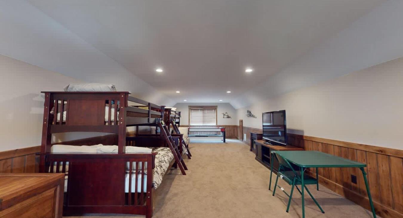 Upstairs loft with 2 sets of bunk beds for up to 4 people comfortably.